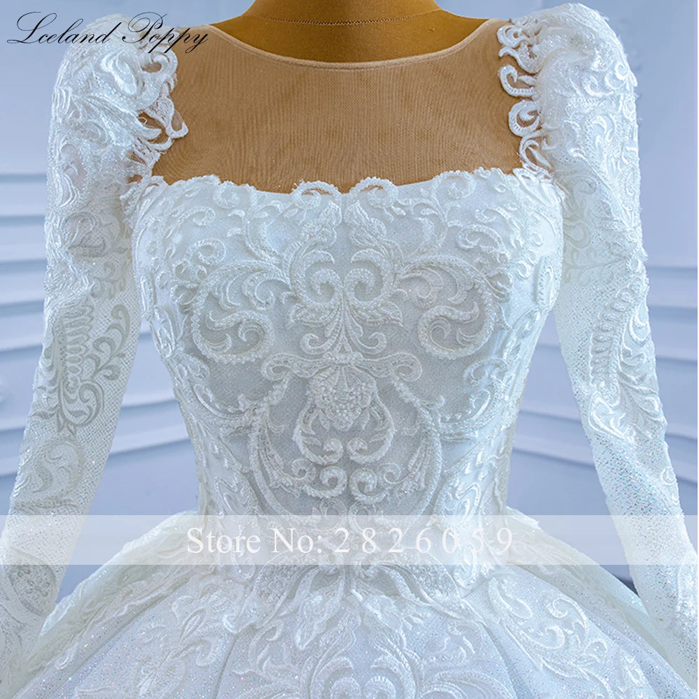 Robe de mariée perlée manches longues – CLEVI Paris