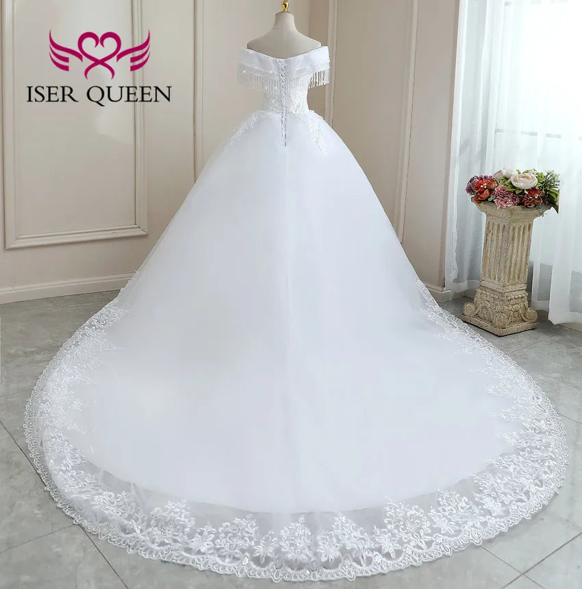 Robe de mariée princesse en dentelle scintillante – CLEVI Paris