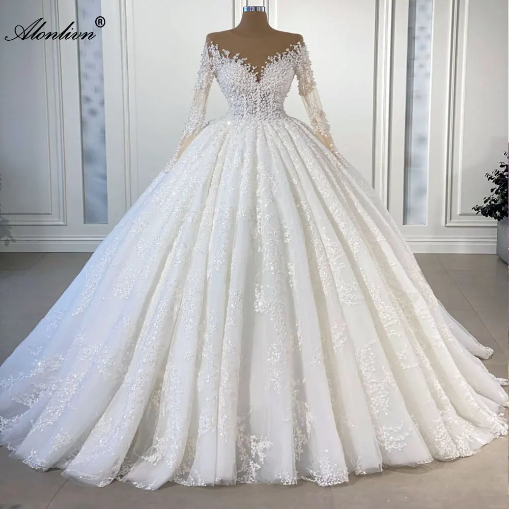 Robe de mariée en organza, col V et dentelle – CLEVI Paris