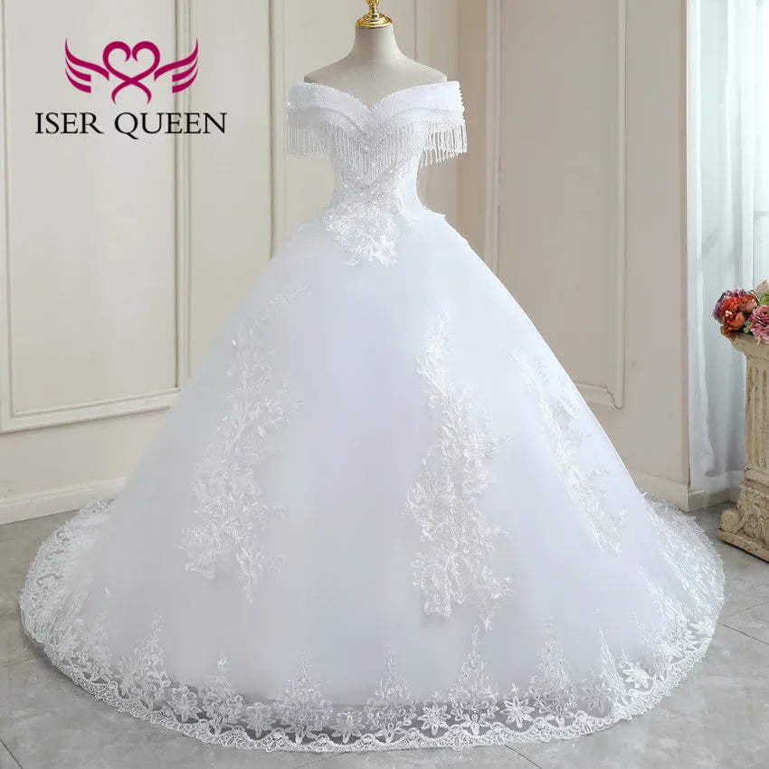 Robe de mariée princesse en dentelle scintillante – CLEVI Paris