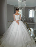 Robe de mariée scintillante en tulle – CLEVI Paris