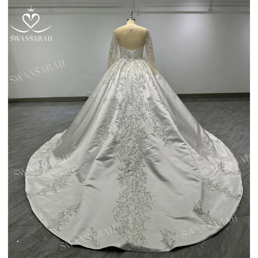 Robe de mariée princesse étagée et perlée – CLEVI Paris
