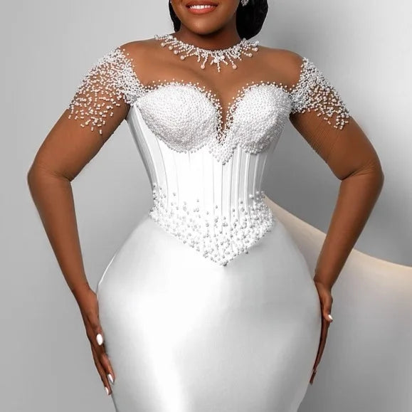 Robe de mariée sirène en satin perlé – CLEVI Paris