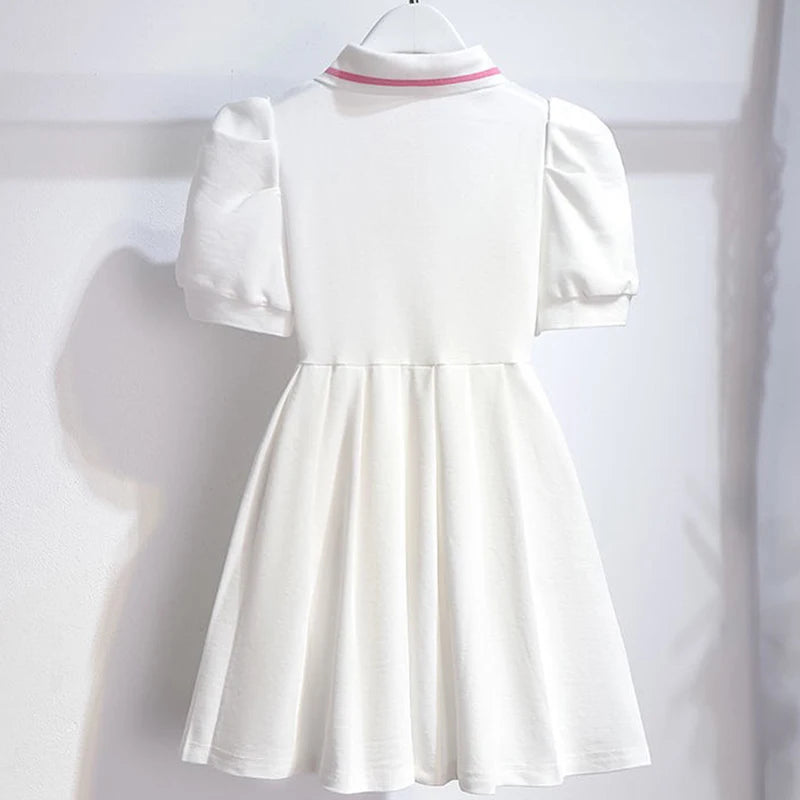 Robe fille plissée à manches bouffantes – CLEVI Paris