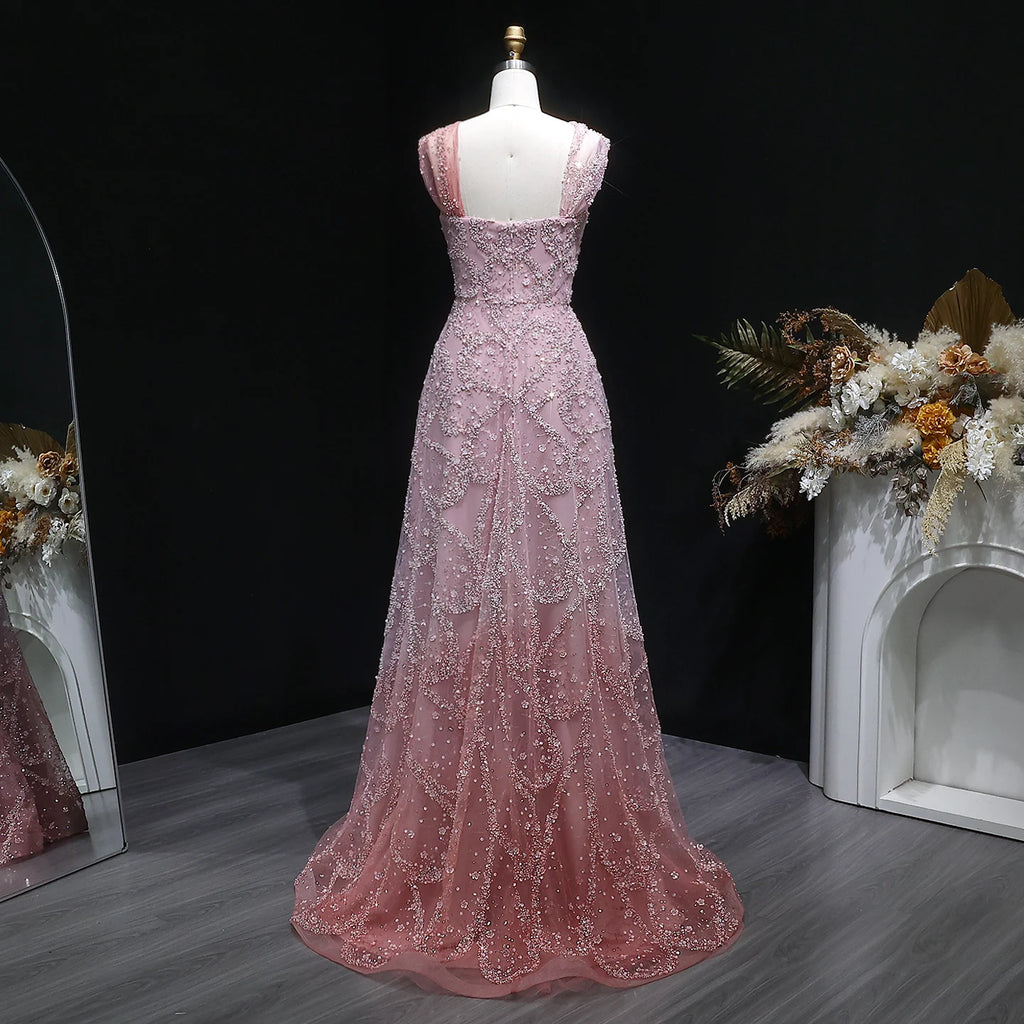 Robe de soirée trapèze perlée et croisée – CLEVI Paris
