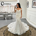 Robe de mariée sirène épaules dénudées – CLEVI Paris