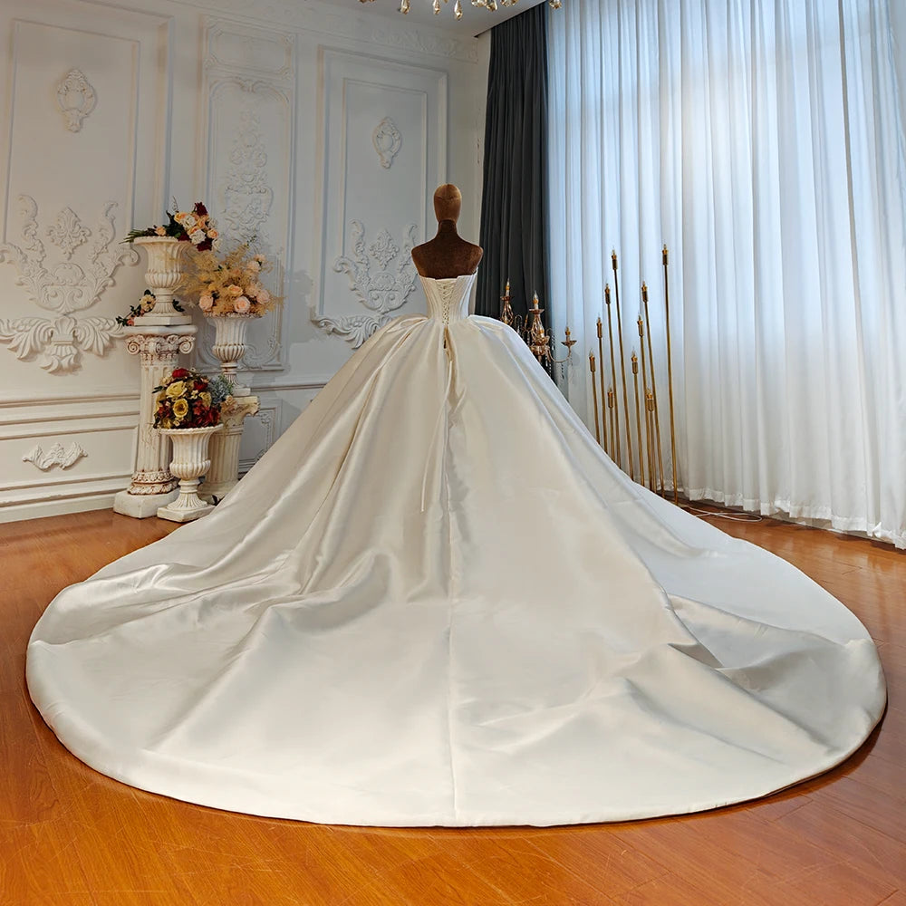 Robe de mariée fleurie en tulle – CLEVI Paris