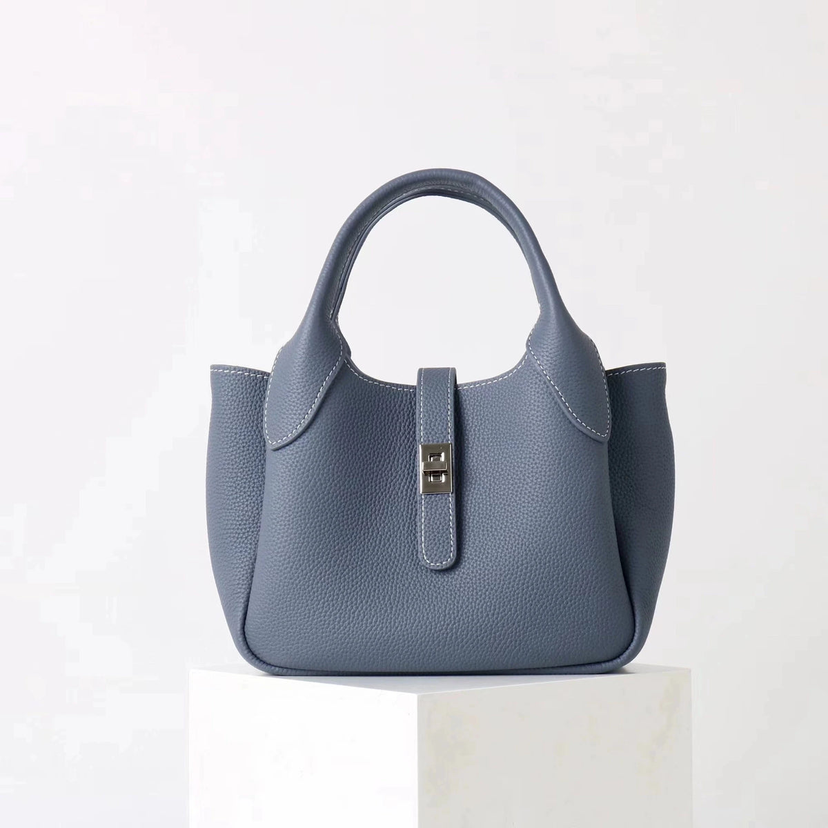Sac seau femme en cuir à poches – CLEVI Paris