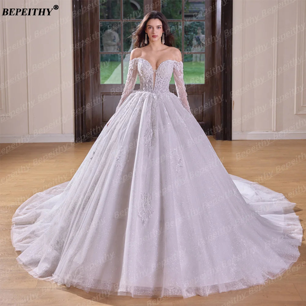 Robe de mariée épaules dénudées – CLEVI Paris