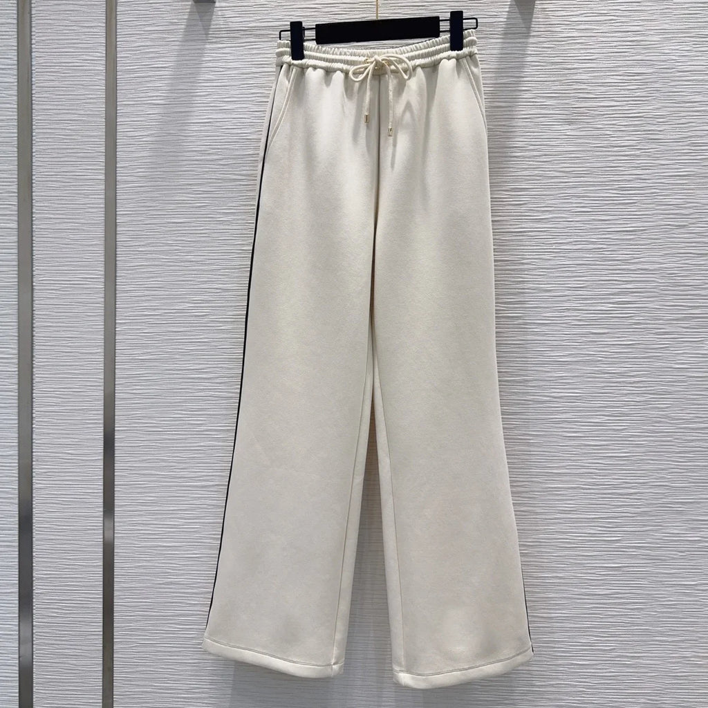 Ensemble femme veste zippée et pantalon large – CLEVI Paris