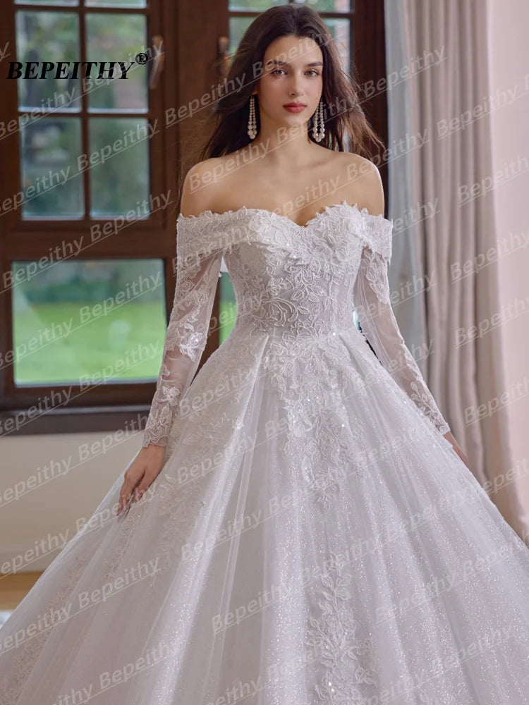 Robe de mariée ligne A en tulle et dentelle - CLEVI Paris