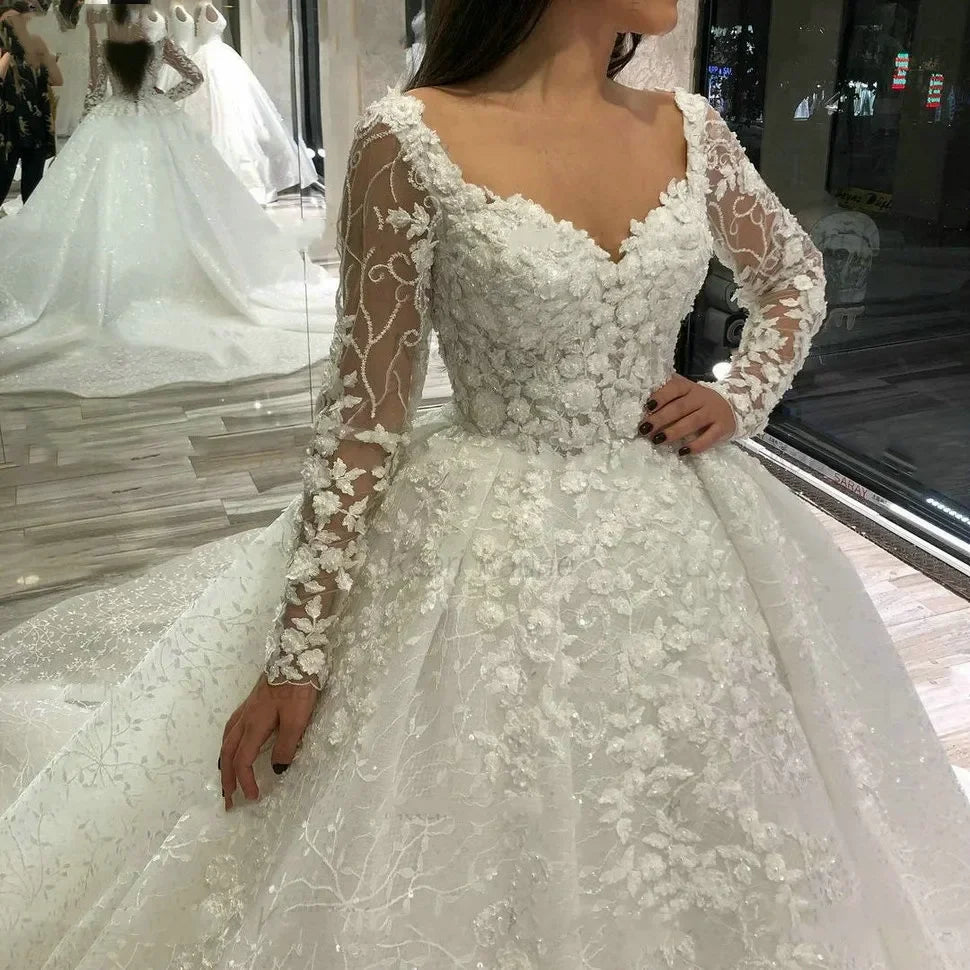Robe de mariée perlée à dos ouvert – CLEVI Paris