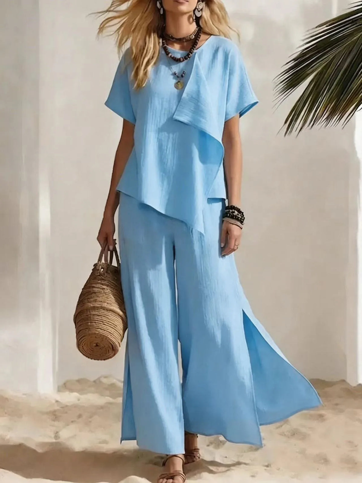 Ensemble femme haut asymétrique et pantalon – CLEVI Paris