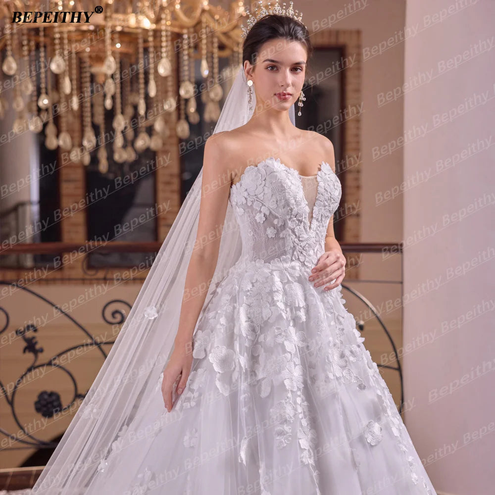 Robe de mariée bohème à fleurs – CLEVI Paris