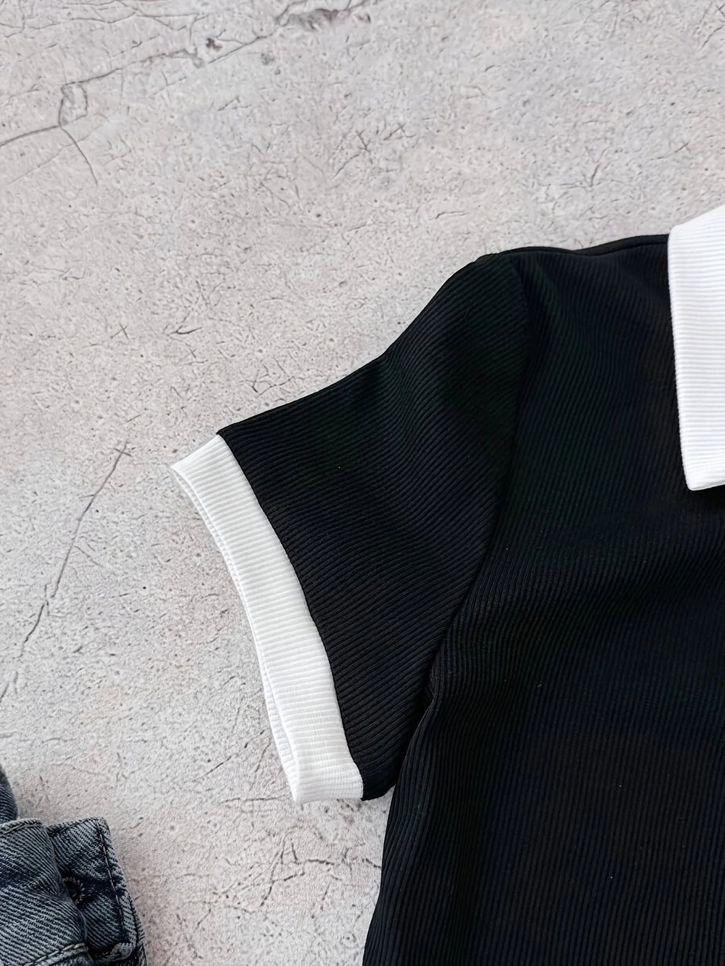 Robe polo fille en noire à motif nœud – CLEVI Paris