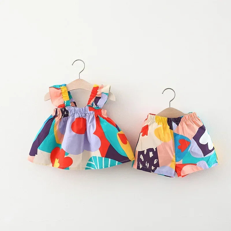 Ensemble fille haut fleuri à bretelles et pantalon – CLEVI Paris
