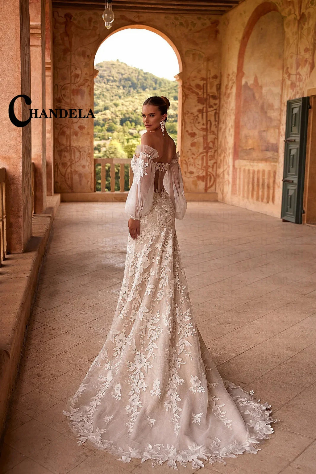 Robe de mariée sirène à col V – CLEVI Paris