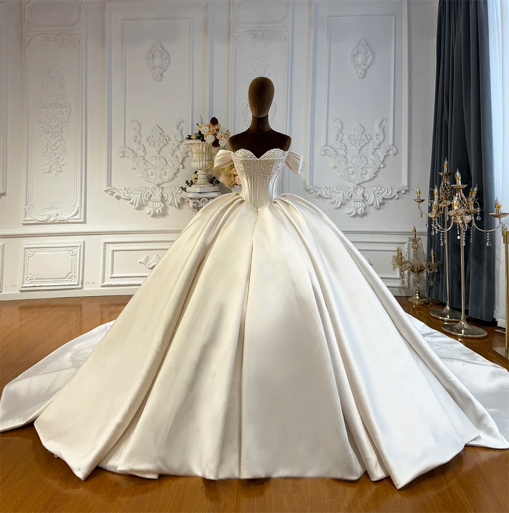 Robe de mariée fleurie en tulle – CLEVI Paris