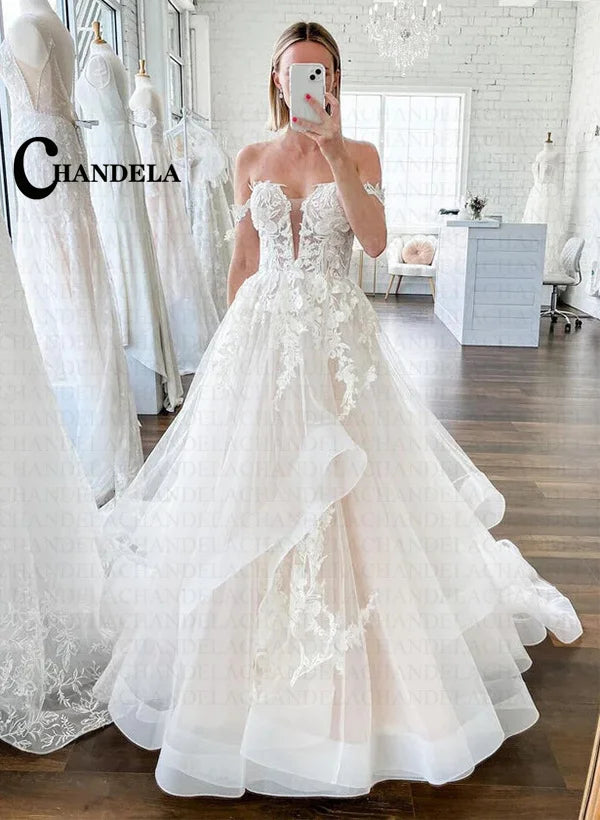 Robe de mariée A-line à volants – CLEVI Paris