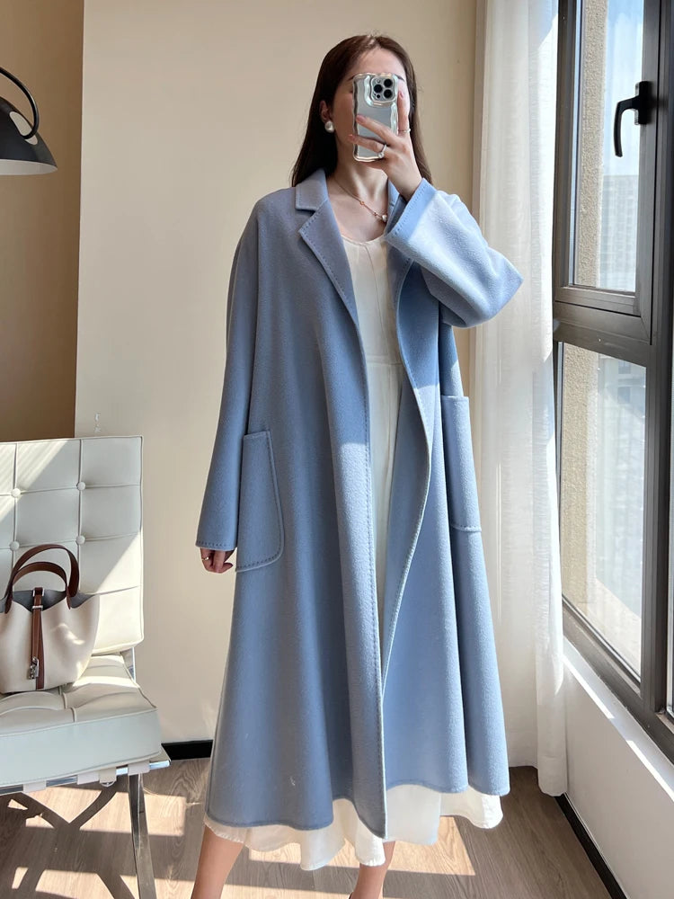 Manteau long femme à ceinture et col revers – CLEVI Paris