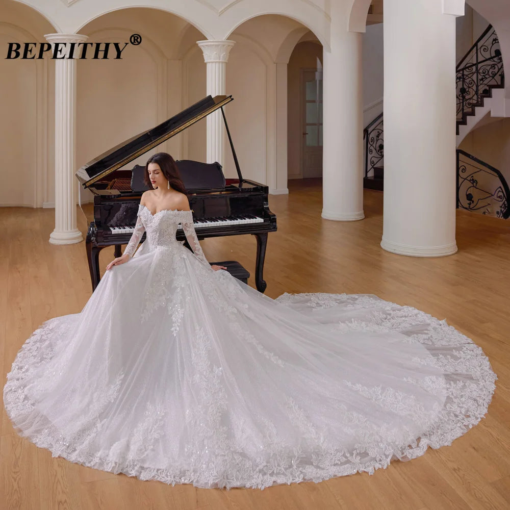 Robe de mariée ligne A en tulle et dentelle - CLEVI Paris