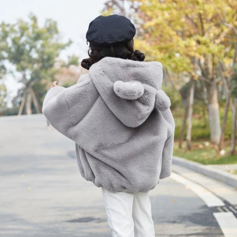 Veste enfant fausse fourrure à capuche – CLEVI Paris