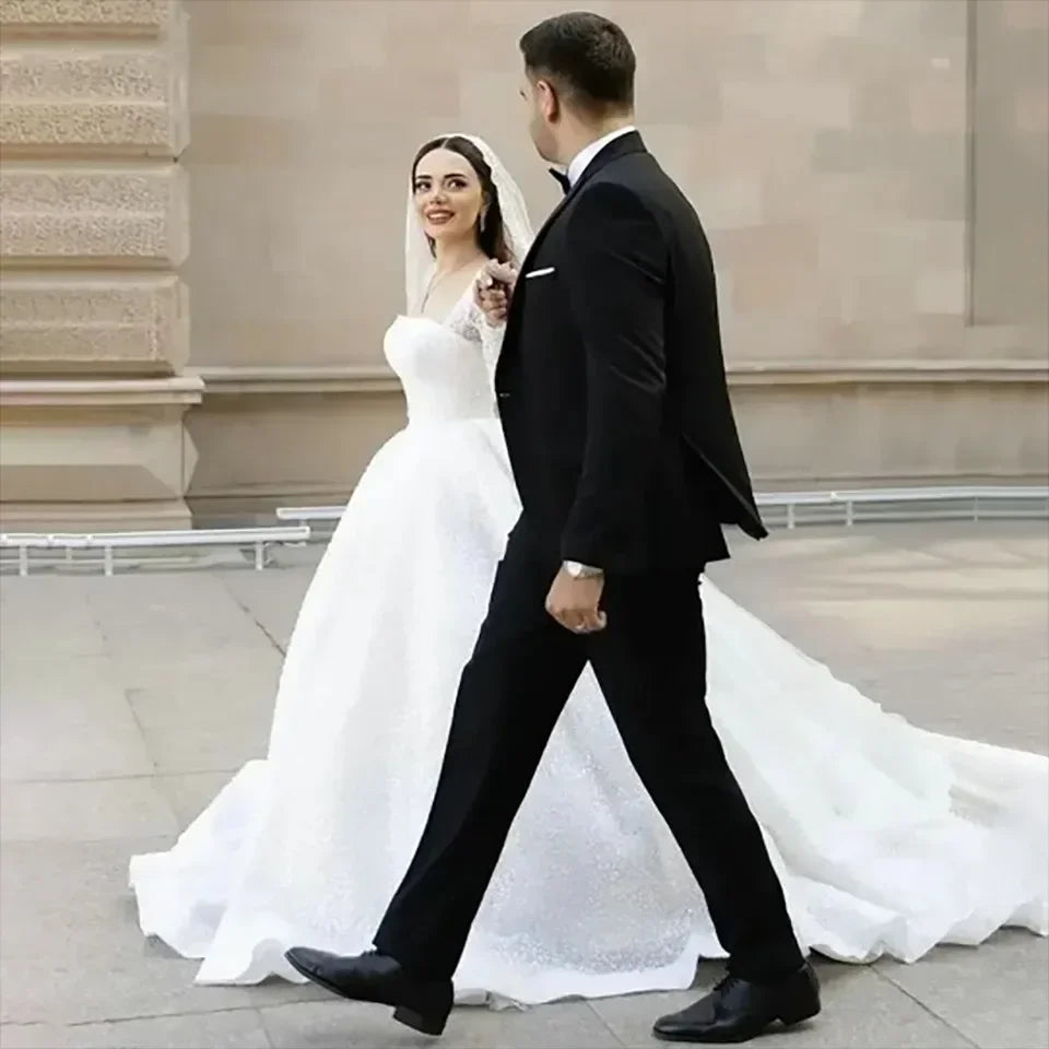 Robe de mariée trapèze perlée à dos ouvert – CLEVI Paris