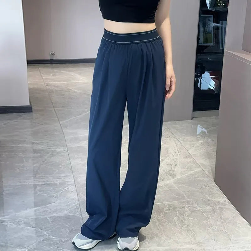 Pantalon femme ample à taille élastique – CLEVI Paris