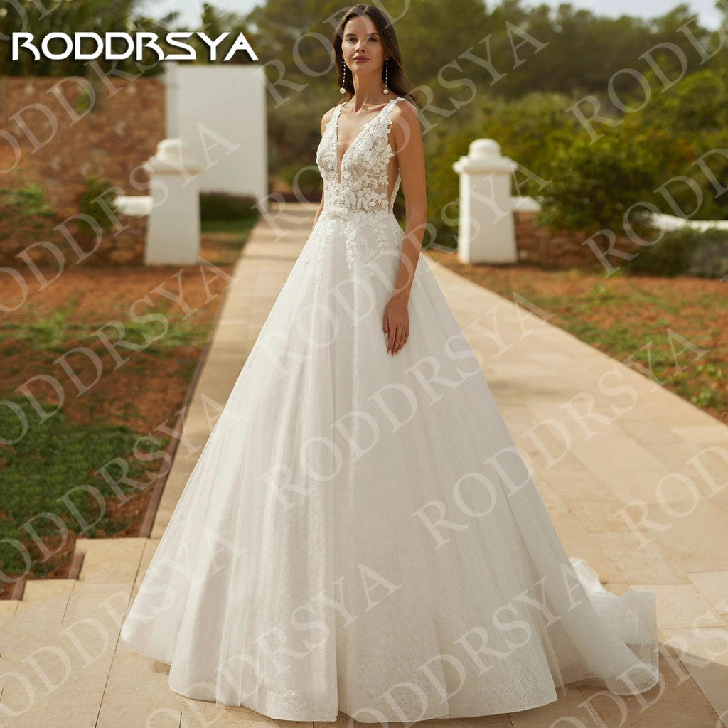 Robe de mariée trapèze en tulle et dentelle – CLEVI Paris