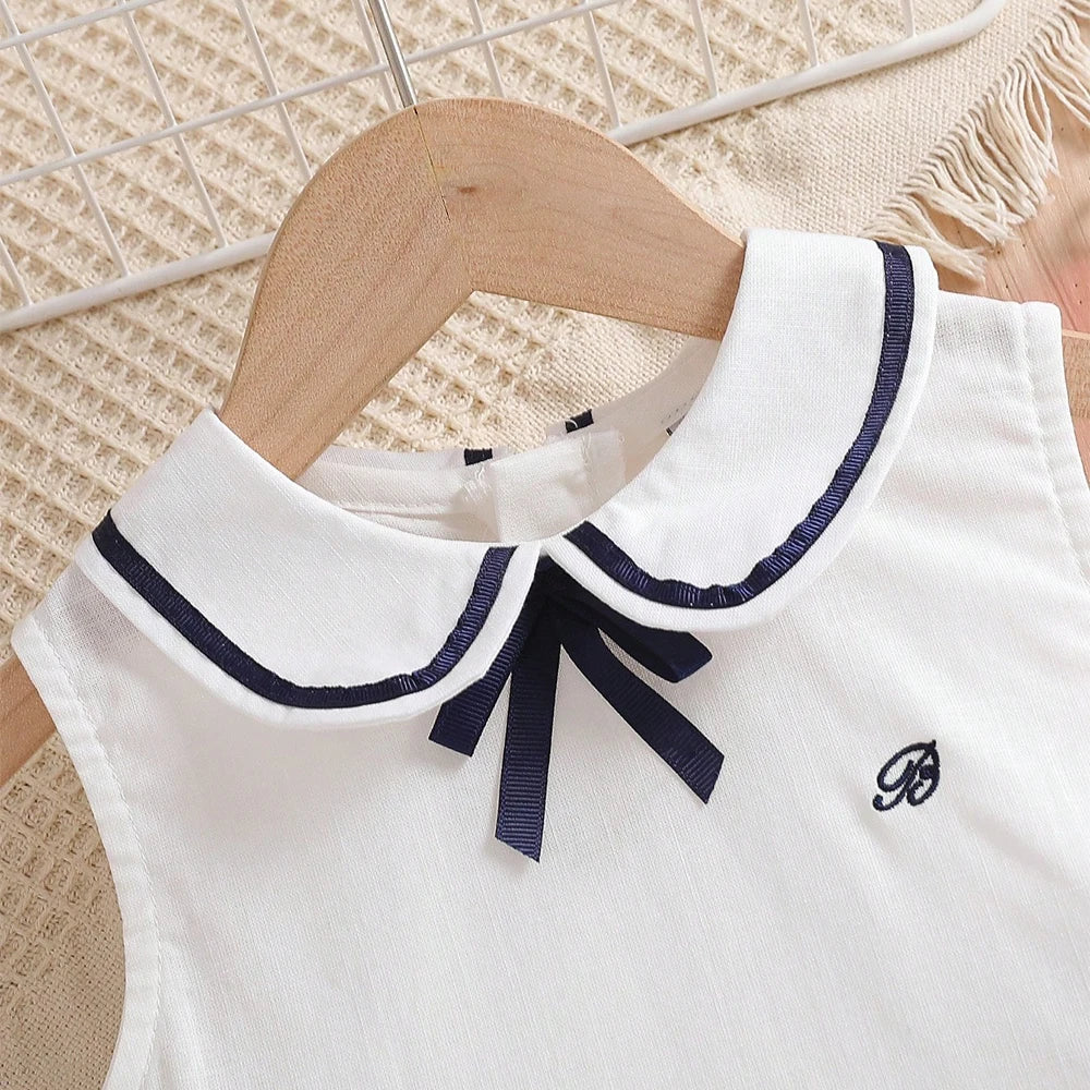 Robe fille en blanc et en coton style preppy – CLEVI Paris
