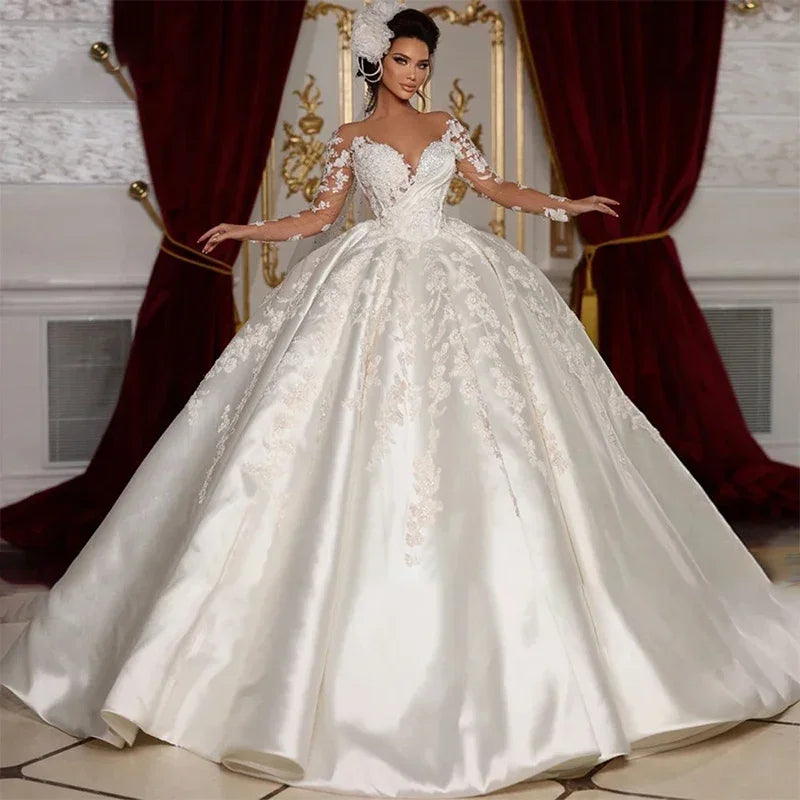 Robe de mariée princesse à manches longues – CLEVI Paris