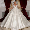 Robe de mariée princesse à manches longues – CLEVI Paris