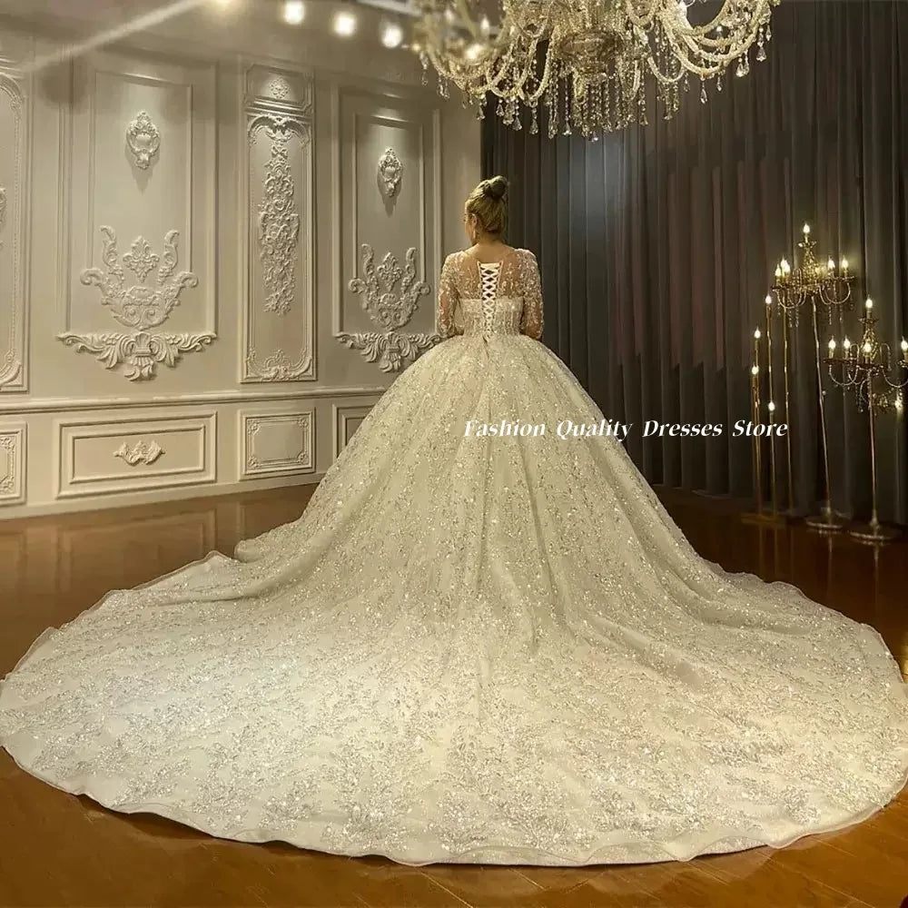 Robe de mariée manches longues, col V – CLEVI Paris