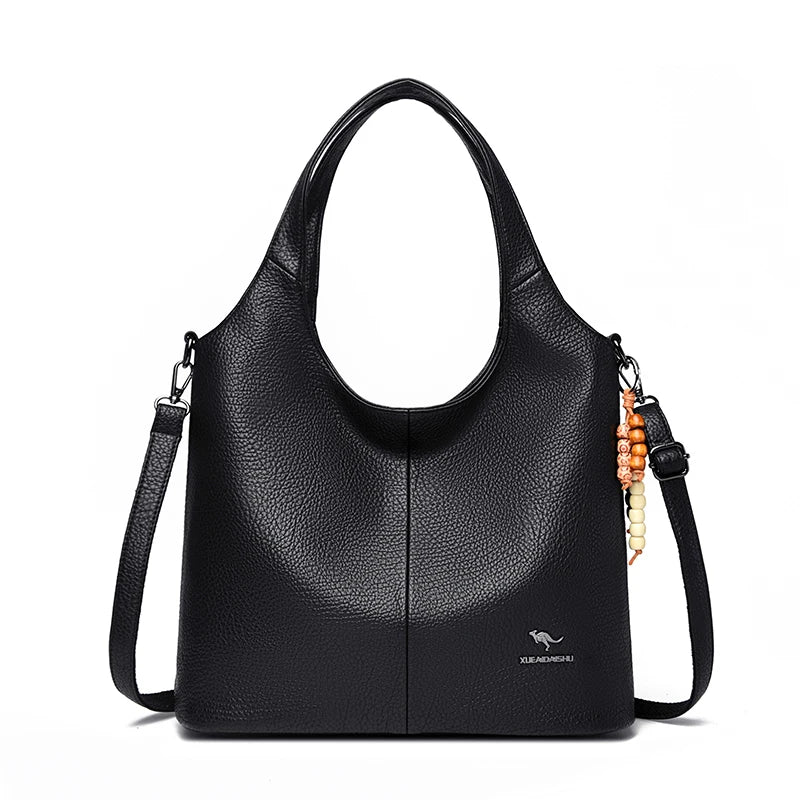 Sac seau femme souple à pompon – CLEVI Paris