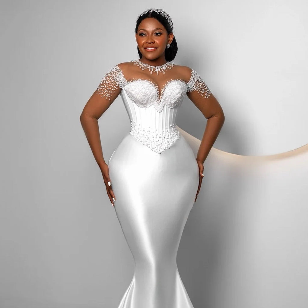 Robe de mariée sirène en satin perlé – CLEVI Paris