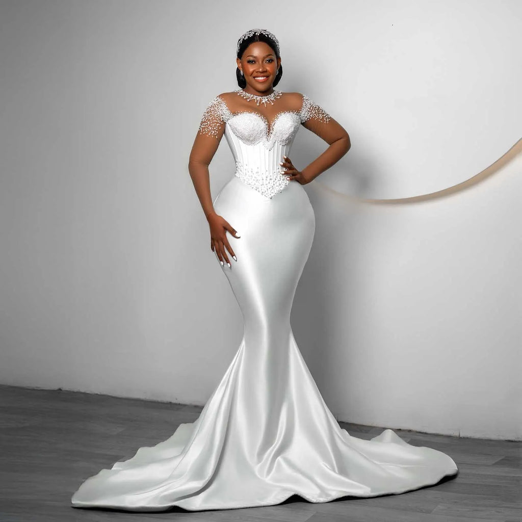 Robe de mariée sirène en satin perlé – CLEVI Paris