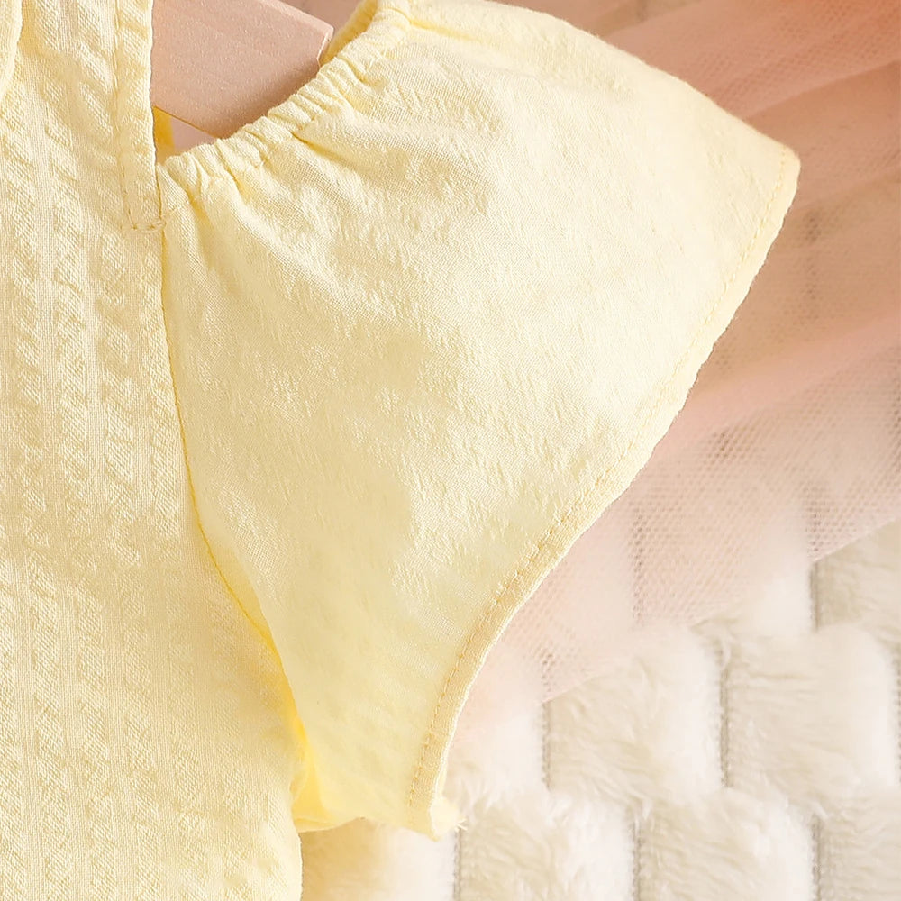 Robe fille en coton à broderie ananas – CLEVI Paris