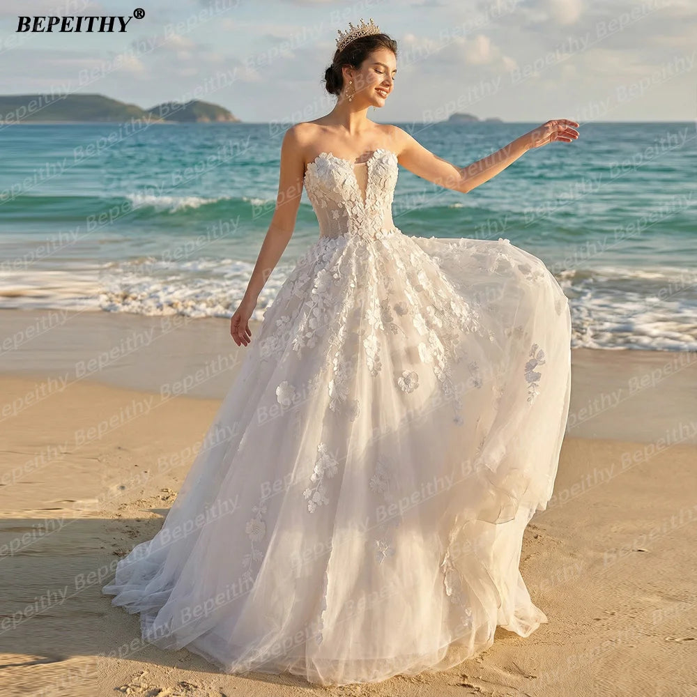 Robe de mariée bohème à fleurs – CLEVI Paris