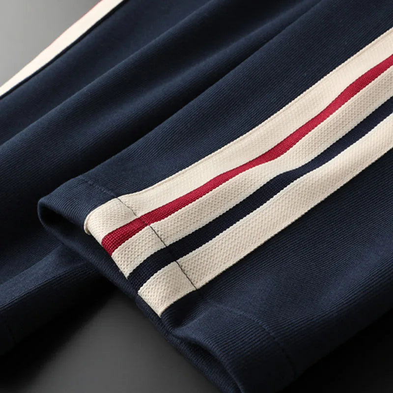 Survêtement homme à bandes et col zippé – CLEVI Paris
