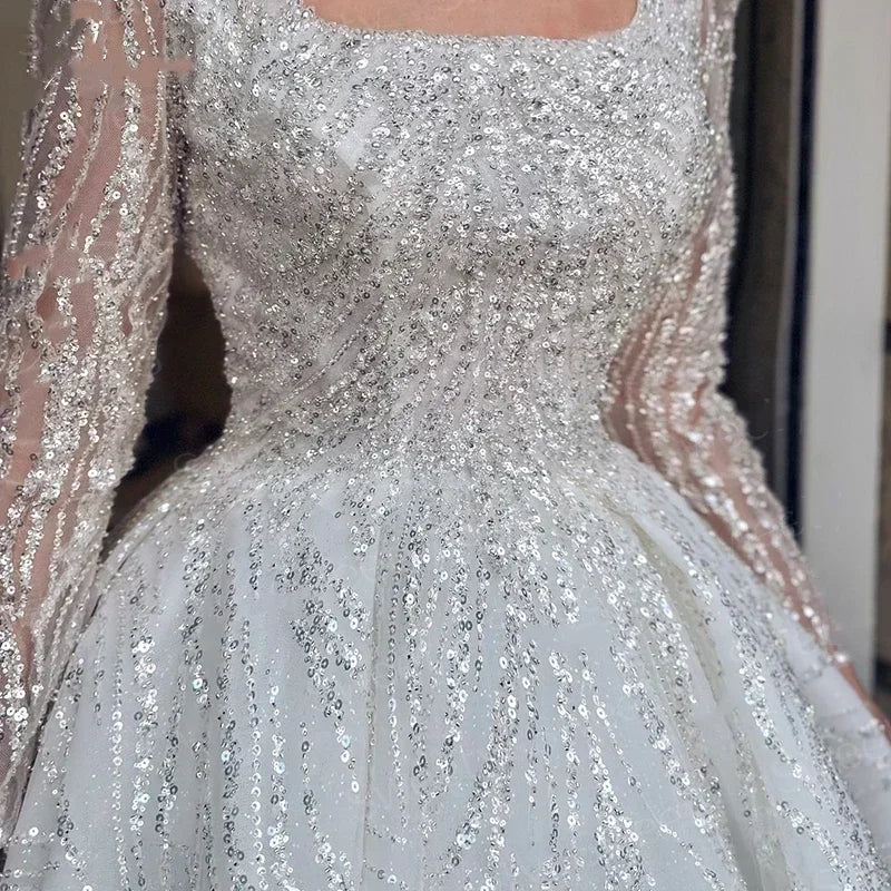 Robe de mariée princesse en tulle à perles – CLEVI Paris