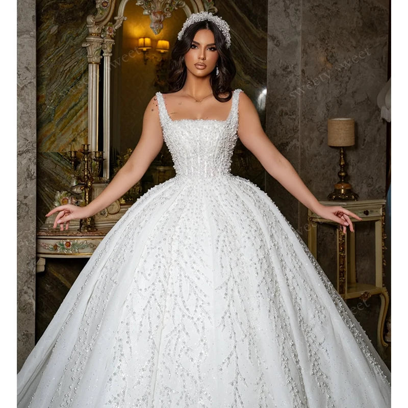 Robe de mariée princesse en organza perlé – CLEVI Paris