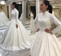 Robe de mariée en dentelle à col rond – CLEVI Paris