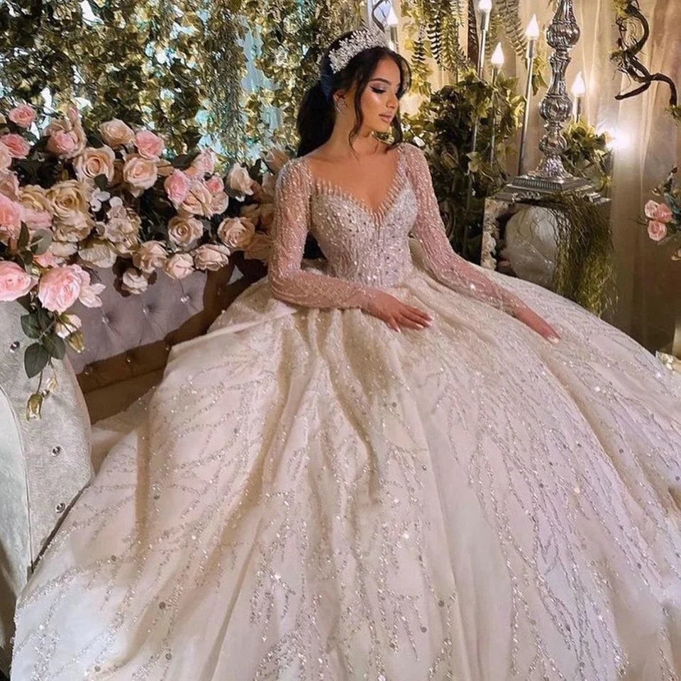 Robe de mariée princesse perlée et pailletée – CLEVI Paris