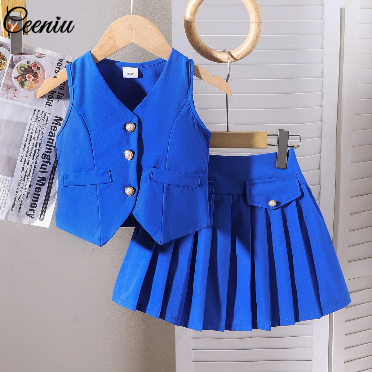 Ensemble fille gilet col V et jupe plissée – CLEVI Paris
