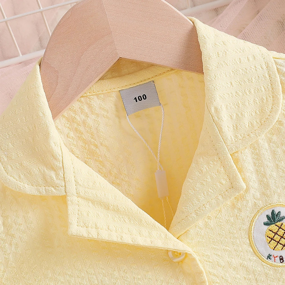Robe fille en coton à broderie ananas – CLEVI Paris
