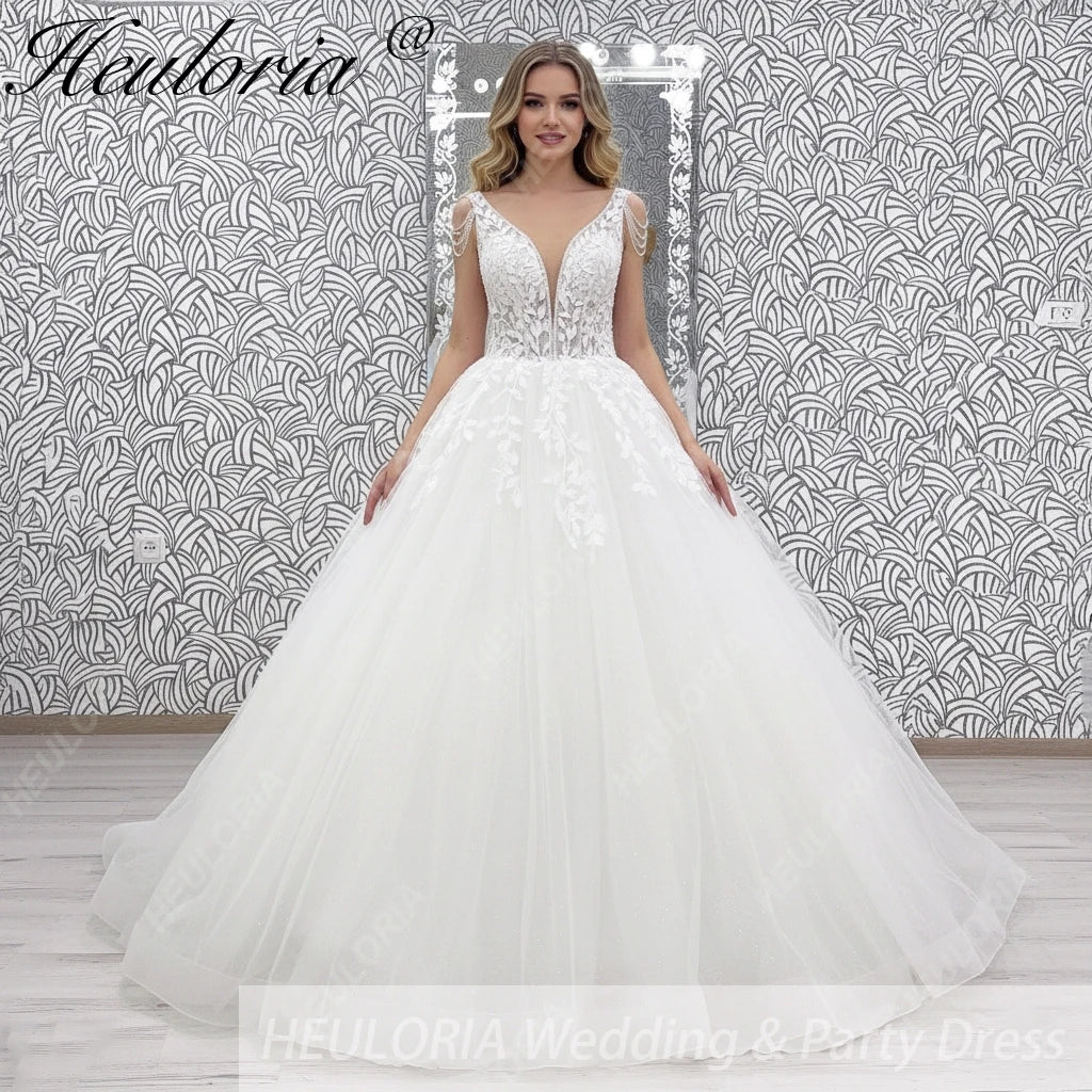 Robe de mariée ligne A en dentelle à perles – CLEVI Paris