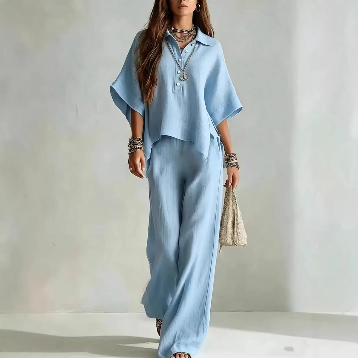 Ensemble femme haut col V et pantalon large – CLEVI Paris