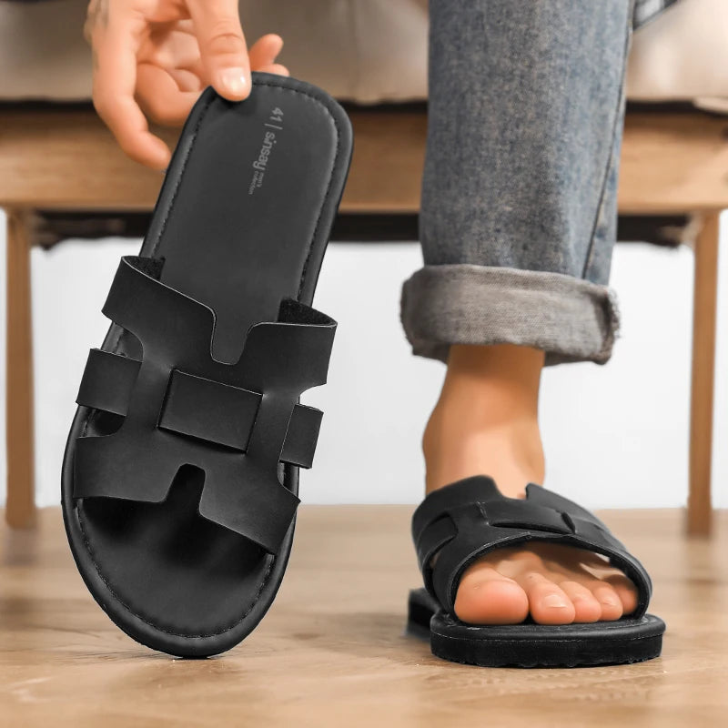 Pantoufles homme noires en cuir refendu – CLEVI Paris