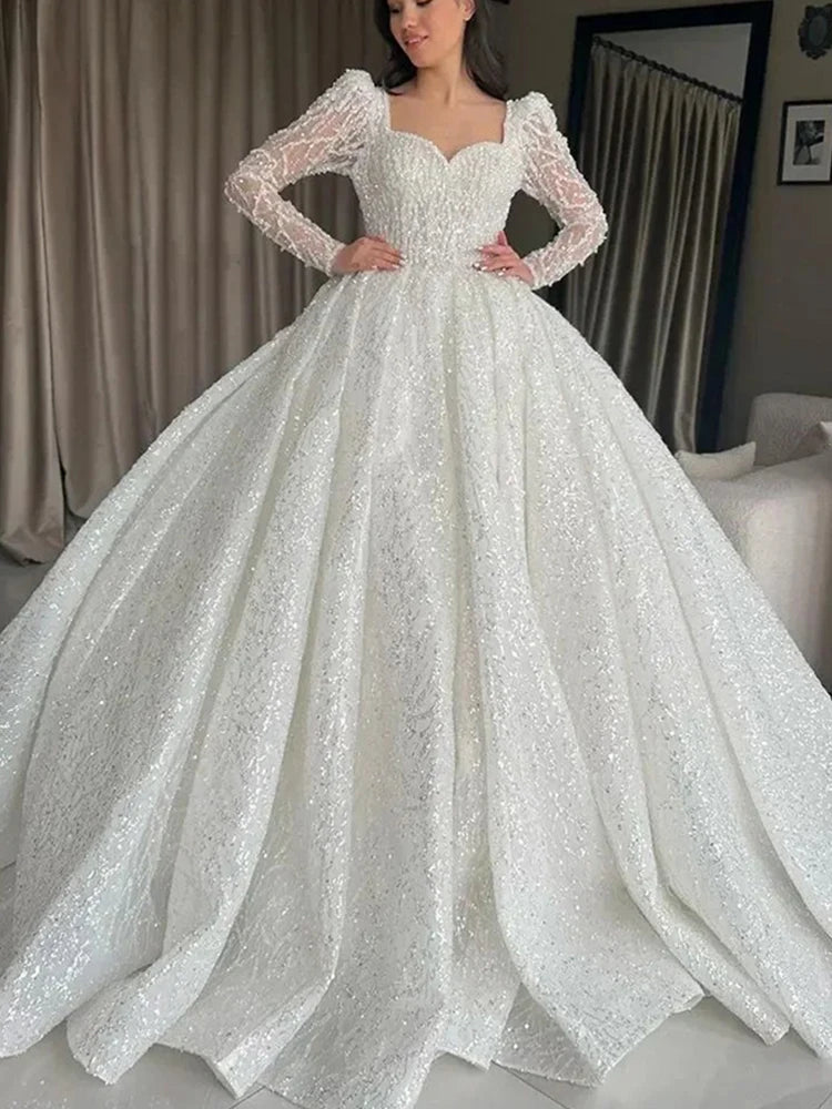 Robe de mariée princesse perlée – CLEVI Paris