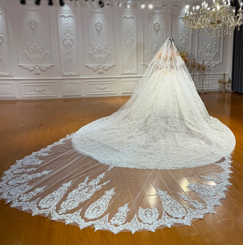 Robe de mariée princesse en tulle fleuri – CLEVI Paris